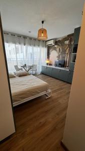 Appartements La Chouette Nimoise : photos des chambres