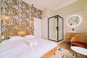 Maisons d'hotes Maison d'exception proche gare - La Maison Des Petits Sablon : photos des chambres
