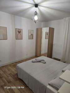 Appartements T2 cosy, calme avec balcon et parking : photos des chambres