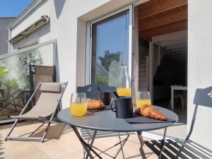 Appartements CAP SURF, Superbe Duplex, 5 min a pied du centre ville : photos des chambres