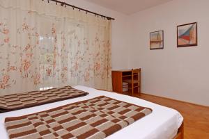 Apartments by the sea Rab - 20222