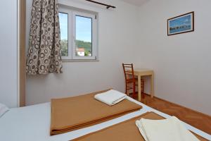 Apartments by the sea Rab - 20222