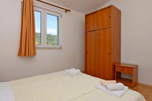 Apartments by the sea Rab - 20222