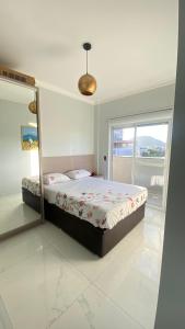 Cobertura nos ingleses com vista para o mar