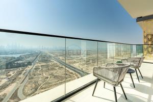 High-Floor 1BR with Balcony Overlooking the Lake, Minutes from the Park, Binghatti Onyx, Jumeirah Village Circle by Deluxe Holiday Homes