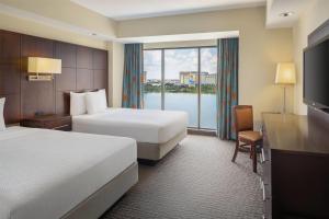One Bedroom Suite, Two Queen Beds, City View-Club Level Access (NO RESORT FEE) room in Ramada Plaza Resort & Suites By Wyndham Orlando International Drive
