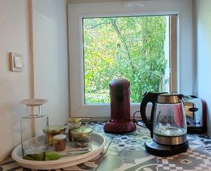 Atypical apartment - panoramic view of wooded garden