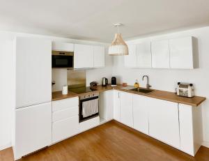 Appartements Le Scandinave - T4 - Terrasse : photos des chambres