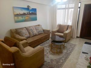 furnished two bedroom apartment with swimming pool, fully equipped gym, private parking space ,children playground and unbeatable scenic city views in kilimani