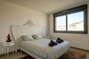 Appartements Le beau Troubadour climatisation centre-ville : photos des chambres