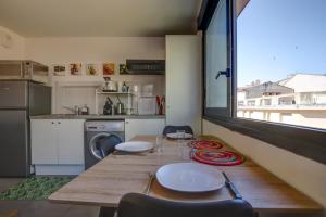 Appartements Le beau Troubadour climatisation centre-ville : photos des chambres