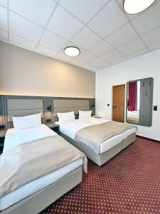 Triple Room room in Hotel Lumen am Hauptbahnhof