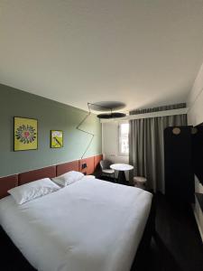 Hotels ibis Strasbourg Aeroport Le Zenith : photos des chambres