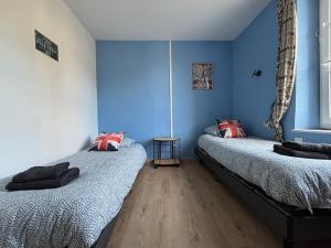 Maisons de vacances Les continents maison spacieuse 4 belles chambres parking privatif terrasse a 5 mn a pied tous commerces et 20 mn plage Omaha Beach : photos des chambres