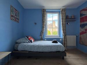 Maisons de vacances Les continents maison spacieuse 4 belles chambres parking privatif terrasse a 5 mn a pied tous commerces et 20 mn plage Omaha Beach : photos des chambres