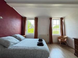 Maisons de vacances Les continents maison spacieuse 4 belles chambres parking privatif terrasse a 5 mn a pied tous commerces et 20 mn plage Omaha Beach : photos des chambres