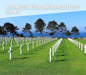 Maisons de vacances Les continents maison spacieuse 4 belles chambres parking privatif terrasse a 5 mn a pied tous commerces et 20 mn plage Omaha Beach : photos des chambres