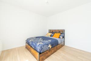 Appartements Le Moulin Basset - A 11min du Stade de France : photos des chambres