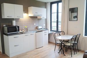 Appartements La Saane - Domaine du Presbytere : photos des chambres