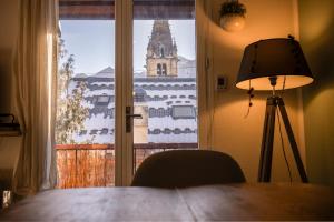 Appartements Douce Altitude - Centre ville - Balcon : photos des chambres