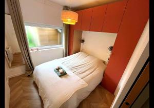 Appartements Charmant T2 Tiny House Lumineux au Coeur de Jouy : photos des chambres