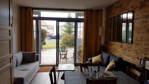 Maisons d'hotes L'Hebergerie : Chambre Familiale avec Terrasse 