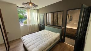 Appartements Chez Max - Terrasse - Climatisation - Parking gratuit : photos des chambres