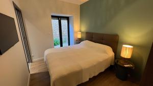 Appartements Chez Max - Terrasse - Climatisation - Parking gratuit : photos des chambres