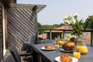 Appartements Ideal famille - piscine interieur chauffee et exterieure : photos des chambres