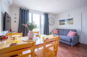 Appartements Ideal famille - piscine interieur chauffee et exterieure : photos des chambres
