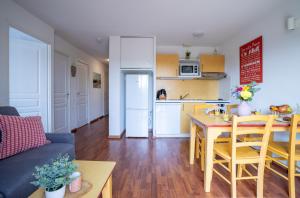Appartements Ideal famille - piscine interieur chauffee et exterieure : photos des chambres