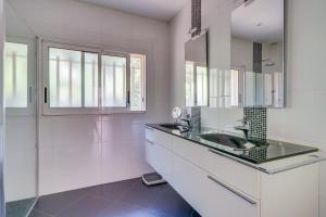 Villas Villa avec piscine aux portes de Bordeaux : photos des chambres