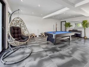 Maisons de vacances Villa avec jacuzzi, sauna&cinema : photos des chambres