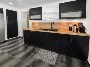 Maisons de vacances Villa avec jacuzzi, sauna&cinema : photos des chambres