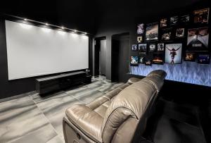 Maisons de vacances Villa avec jacuzzi, sauna&cinema : photos des chambres