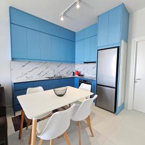 Blue Horizon And Seaside Serenity