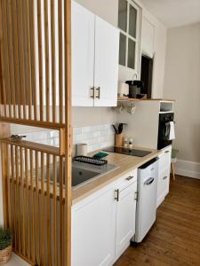 Appartements Le Petit Louis : photos des chambres