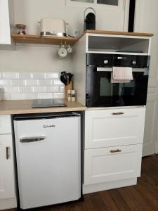 Appartements Le Petit Louis : photos des chambres