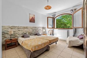 Appartements L-Eugenie - appt climatise vue montagne : photos des chambres