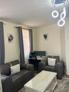 Sahel Executive Studio apartment with separate kitchen and bathroom in another section from the main room for cheap accommodation in Elgon View near Eldoret sports club,Rapha Hospital, Naivas supermarket, rupha mall, and Eldoret International Airport