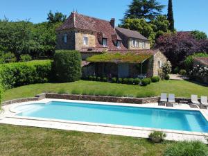 Maisons de vacances Maison de campagne avec piscine privee et parking a Sainte Alvere - FR-1-824-4 : photos des chambres
