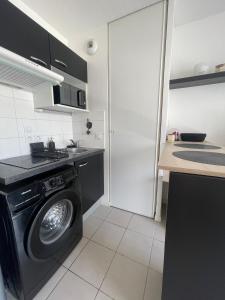 Appartements Charmant appartement avec place de parking privee : photos des chambres