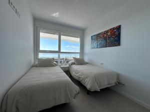 Gran Canet Salva, moderno apartamento con terraza y vistas al mar