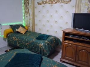 Sejours chez l'habitant Une Chouette Maison : photos des chambres