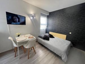 Appartements Studio meuble proche gare et centre ville : photos des chambres