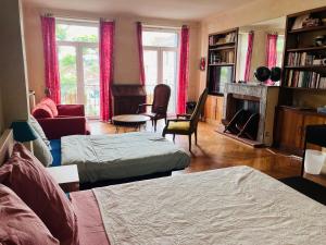 B&B / Chambres d'hotes Au dessus des arcades : photos des chambres