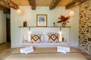 Maisons d'hotes Les Metairies d Arthur : photos des chambres