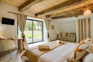 Maisons d'hotes Les Metairies d Arthur : photos des chambres