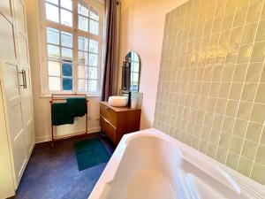 Appartements Loft T2 avec terrasse sur la Grand Place d-Arras : photos des chambres