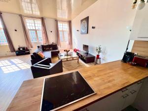 Appartements Loft T2 avec terrasse sur la Grand Place d-Arras : photos des chambres